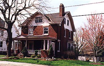 A stately early period double gabled foursquare with clinker brick (1900)