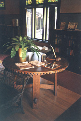 Gustav Stickley white oak table with circular leather top