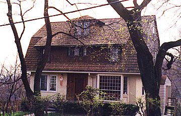 Stucco and shingle Craftsman style (1912)